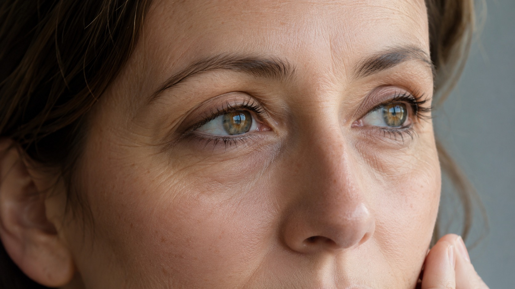 Tired eyes and fine lines after 40